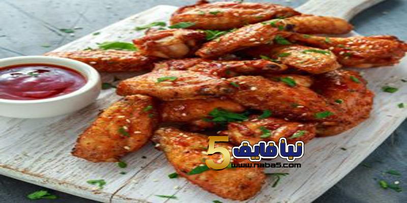 أجنحة الدجاج الحمراء بالصوص استمتعي بالطعم الخطييير